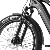 A close-up of the 26" Step Over Electric Mountain Bike - Black by Evolvate Pro, showcasing its BAFANG rear hub motor.