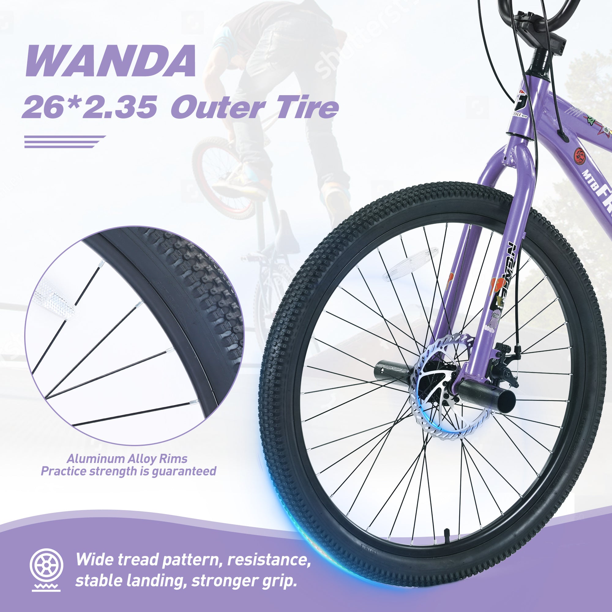A close-up of a Freestyle Kids Bike's front wheel, featuring a 26*2.35 outer tire from the brand Evolvate Pro. The wheel has aluminum alloy rims and showcases a wide tread pattern for enhanced resistance and stronger grip. Highlighted sections focus on the tread pattern and Shimano 7-Speed system, ensuring stable landing on this Evolvate Pro Freestyle Kids Bike - 26-Inch, Double Disc Brakes, suitable for boys and girls age 12+ in vibrant purple.